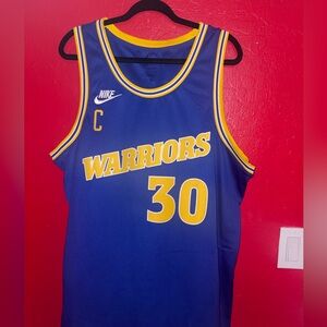 CURRY #30 Nike Warriors Blue and Yellow Jersey. Market valued at $140